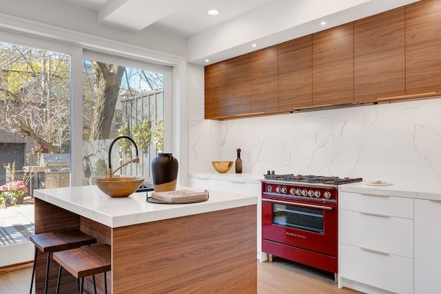 Premium wrapped kitchen with warm wood finish